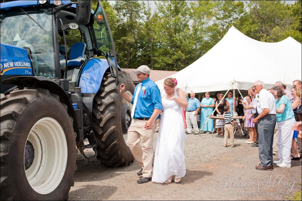 wedding photography outdoor bride groom wyalusing pa reception tent birdseed tractor