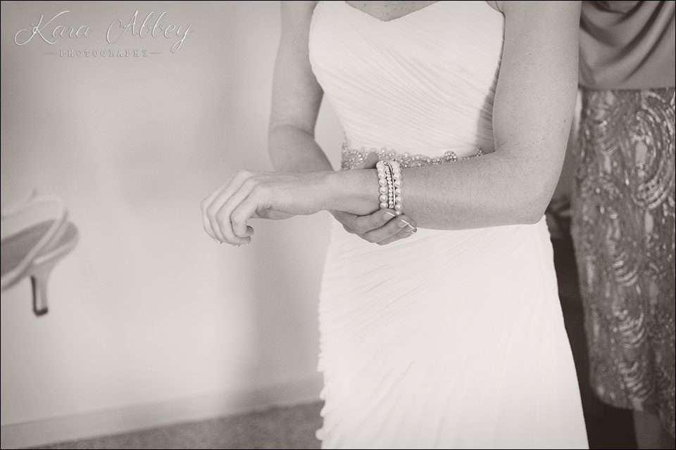 wedding day photography vestal ny bride getting ready prep white dress gown jewelry bracelet