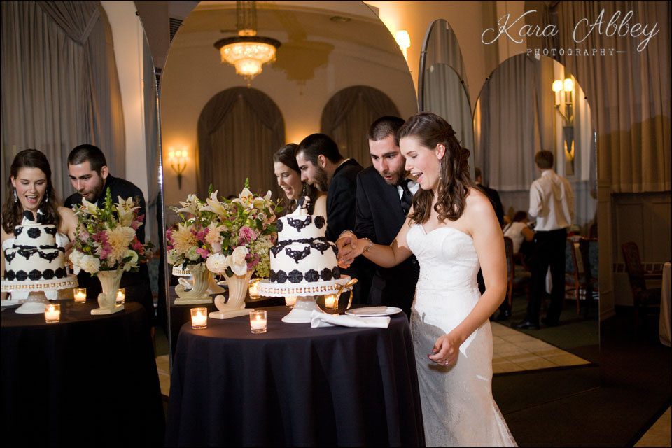 wedding day photography cake topper cutting the cake binghamton club ny
