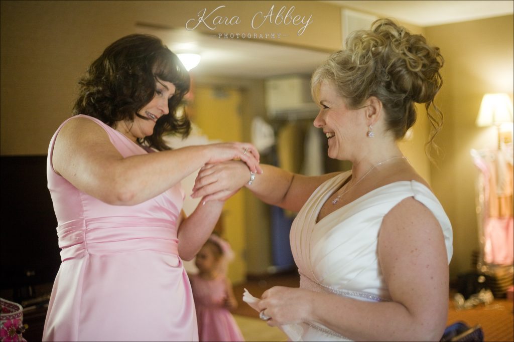 Wedding Photography Owego NY Irwin PA Greensburg PA Monroeville PA Pittsburg PA getting ready bride maid of honor laugh