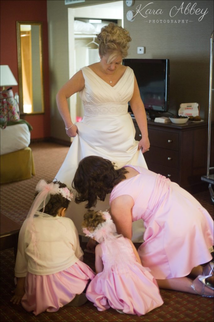 Wedding Photography Owego NY Irwin PA Greensburg PA Monroeville PA Pittsburg PA getting ready bride maid of honor laugh shoes