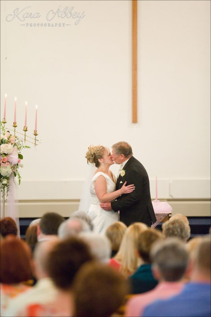 Wedding Photography Owego NY Irwin PA Greensburg PA Monroeville PA Pittsburg PA emotional bride groom church ceremony first kiss