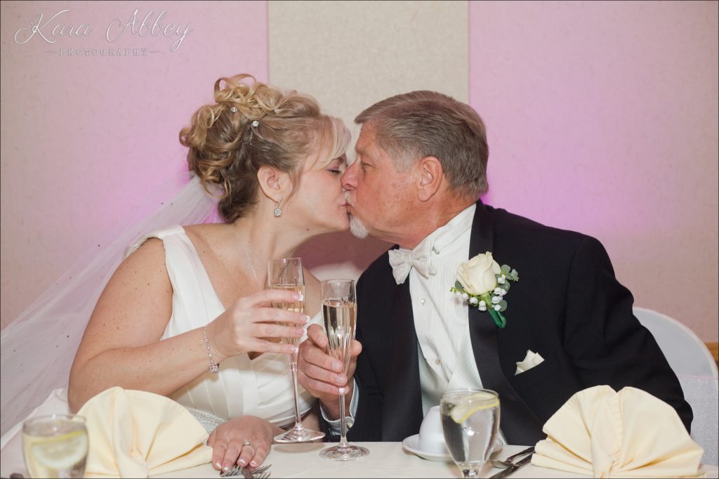 Wedding Photography Owego NY Irwin PA Greensburg PA Monroeville PA Pittsburg PA Treadway Inn toast kiss bride groom