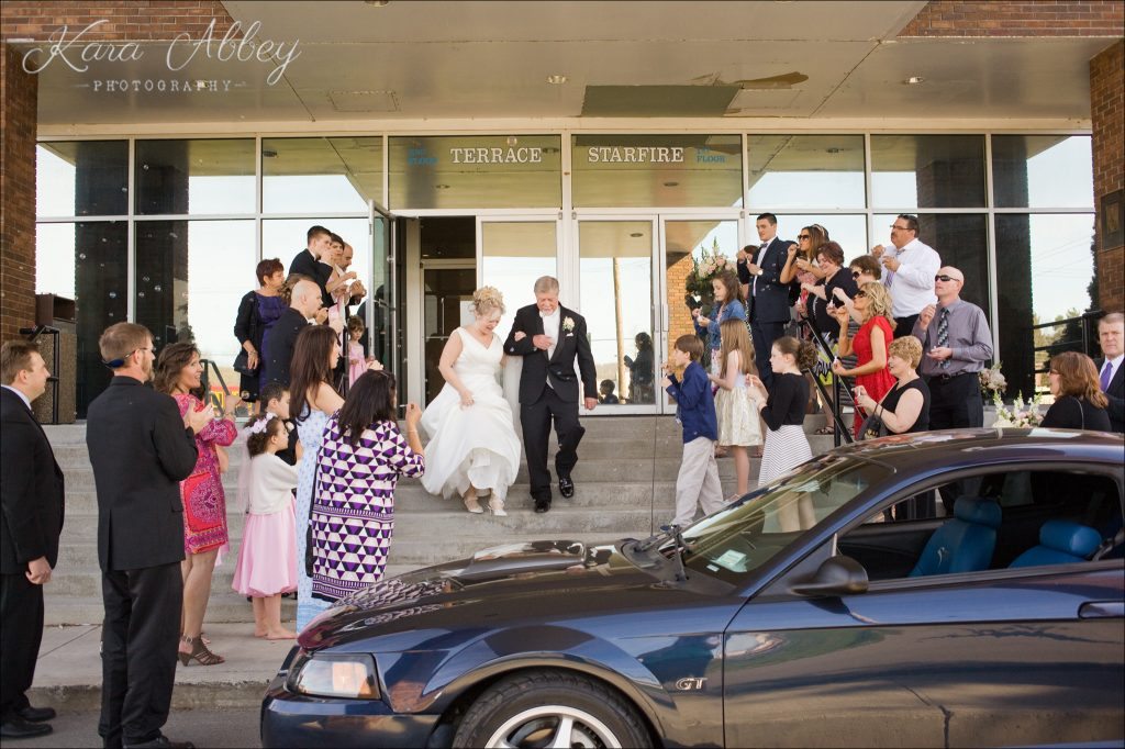 Wedding Photography Owego NY Irwin PA Greensburg PA Monroeville PA Pittsburg PA Treadway Inn bubbles exit reception mustang