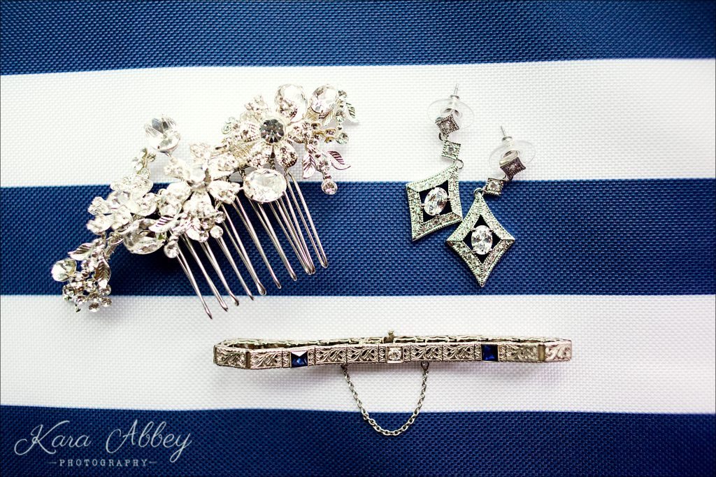 rainy day wedding photography Vestal NY bridal details earrings bracelet pin