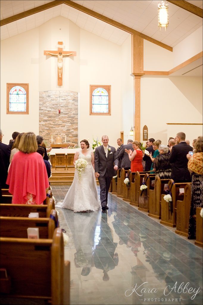 rainy day wedding photography Vestal NY Our Lady of Sorrows Ceremony recessional