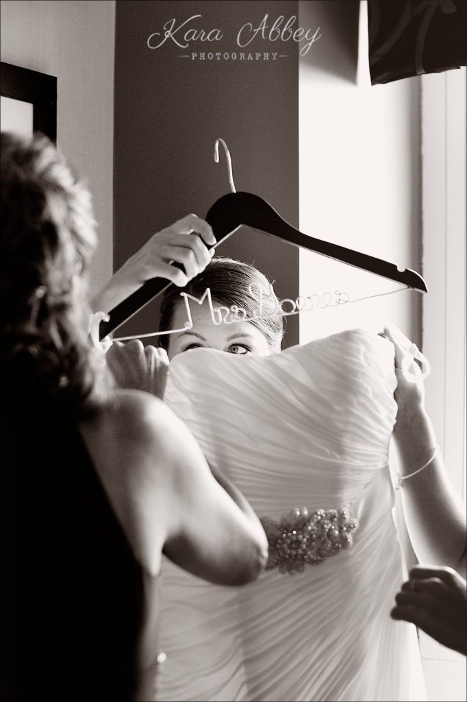 Binghamton, NY, Wedding Photography Holiday Inn Bridal Details Hanger Getting Ready Gown