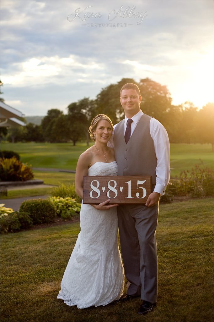 Wedding Photography at the Corning Country Club in Corning, NY Bride and Groom Portrait Sunset Homemade Sign