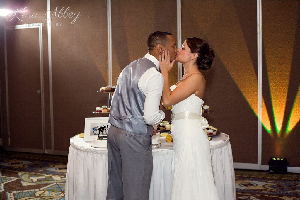 Binghamton, NY, Wedding Photography Holiday Inn Reception Cutting the Cake