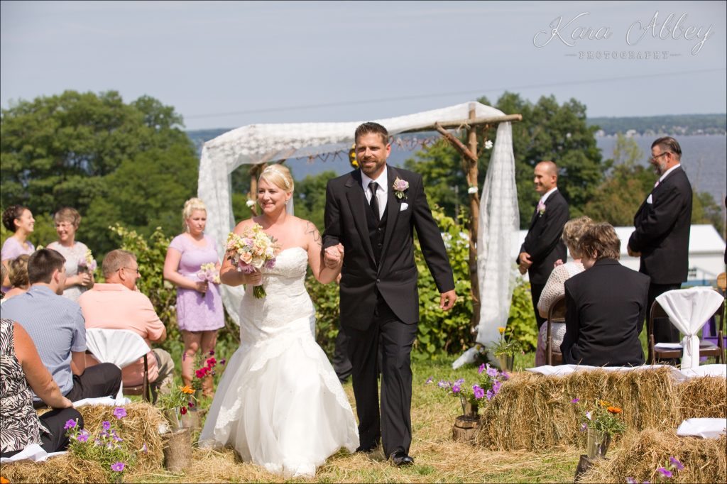 Country Wedding Photography Weaver View Farms Penn Yan, NY Ceremony Hay bales Recessional