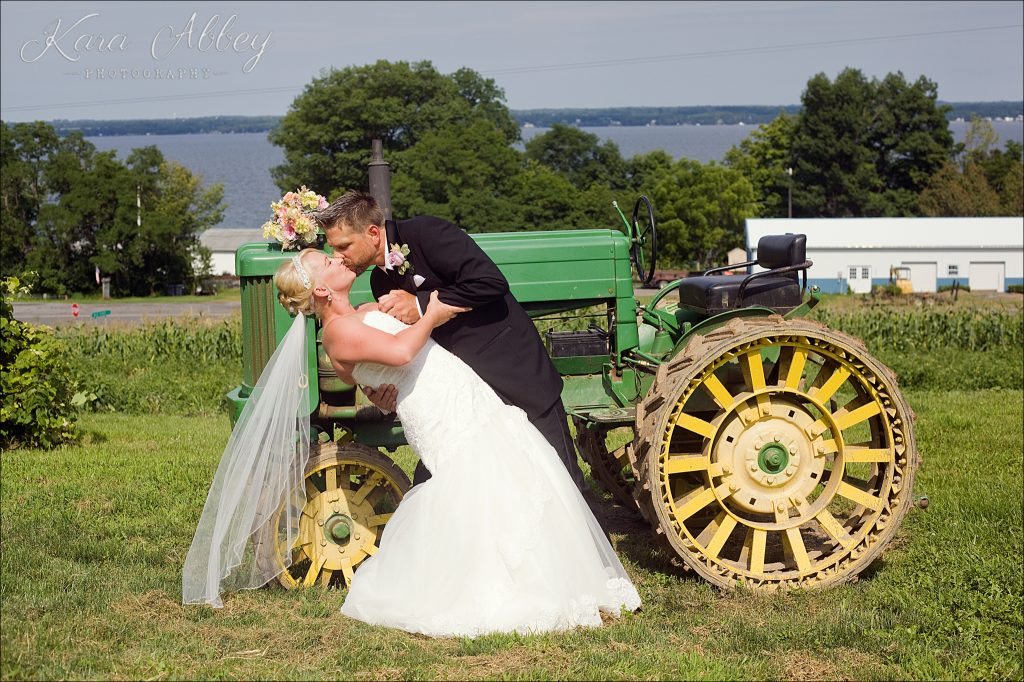 Country Wedding Photography Weaver View Farms Penn Yan, NY Bride Groom Portrait Tractor Kiss