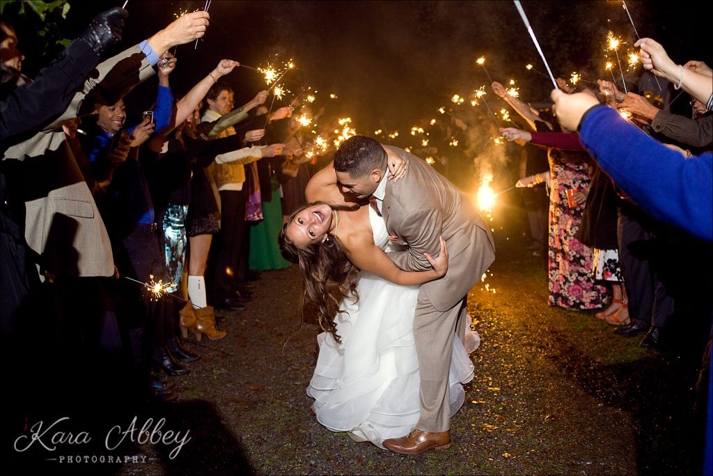 rainy day wedding photographer Tioga Gardens Owego, NY Sparkler Exit