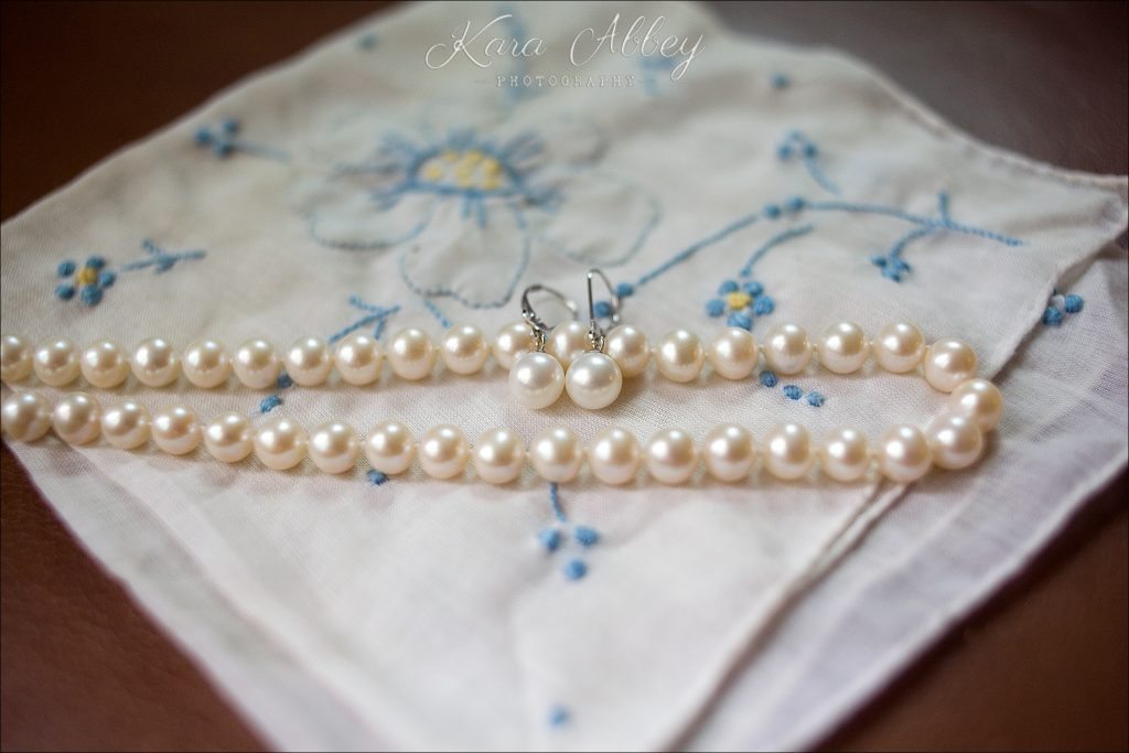 rainy day wedding photographer Binghamton, NY bridal getting ready details necklace earrings pearls