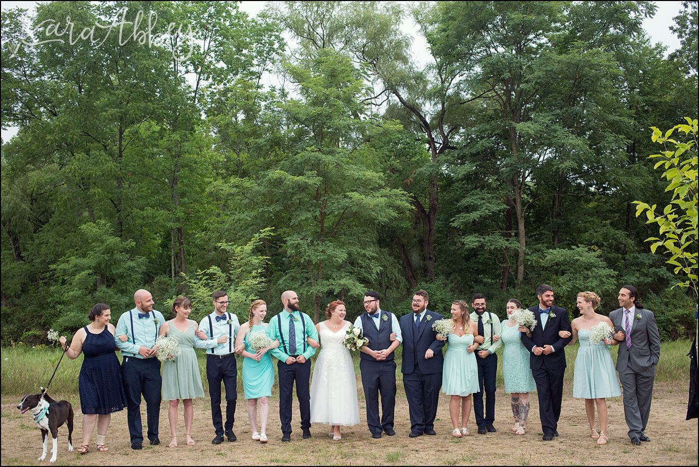 Rustic Pastel Rainy Summer Wedding First Look at Robert Treman State Park in Ithaca, NY by Kara Abbey Photography in Irwin, PA