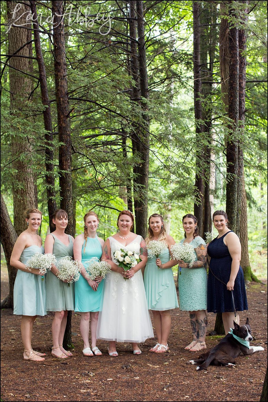 Rustic Pastel Rainy Summer Wedding First Look at Robert Treman State Park in Ithaca, NY by Kara Abbey Photography in Irwin, PA