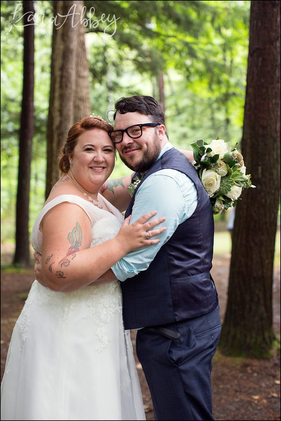 Rustic Pastel Rainy Summer Wedding First Look at Robert Treman State Park in Ithaca, NY by Kara Abbey Photography in Irwin, PA