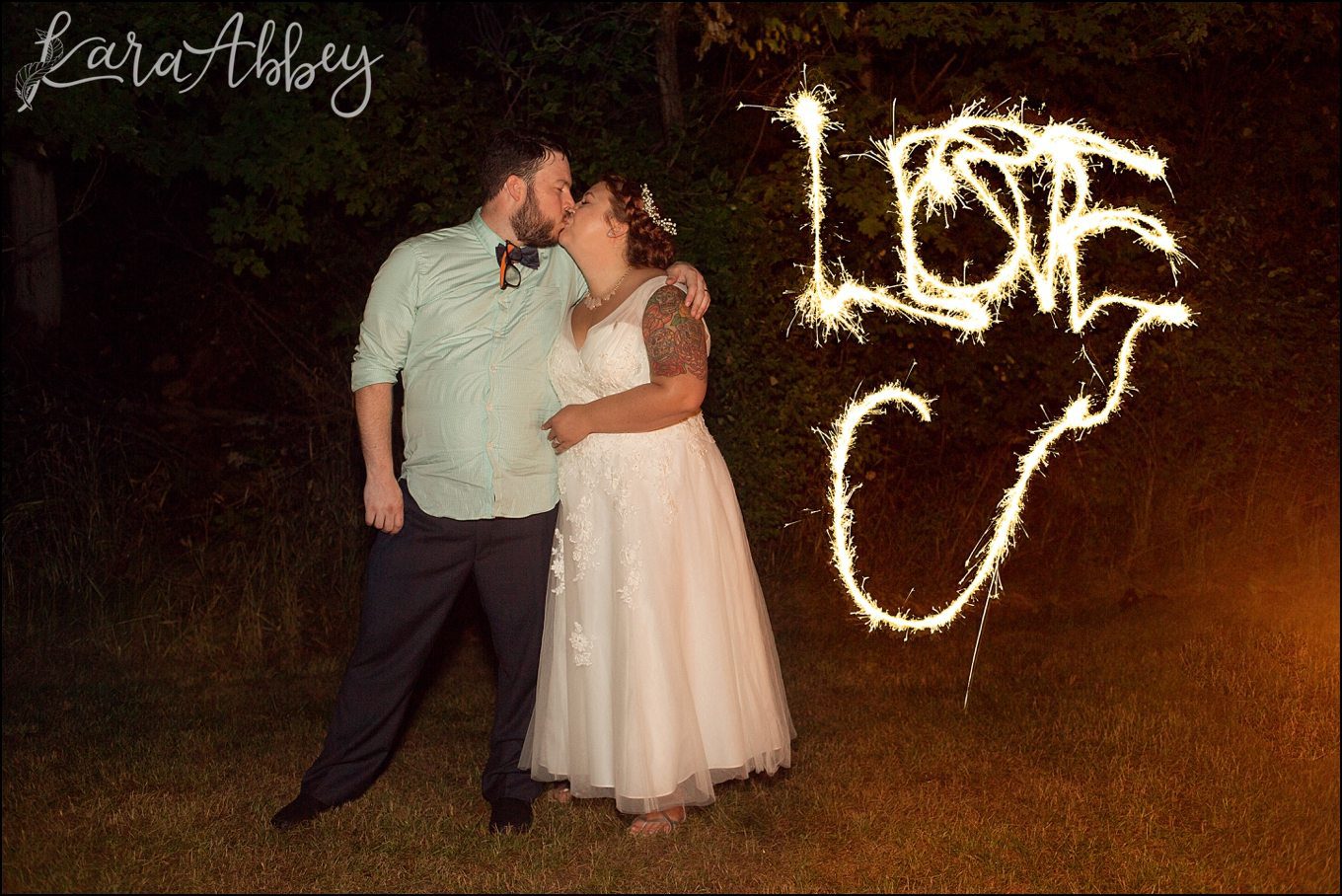 Rustic Pastel Rainy Summer Wedding at the Barn at Willseyville in Ithaca, NY SPARKLERS! by Kara Abbey Photography in Irwin, PA