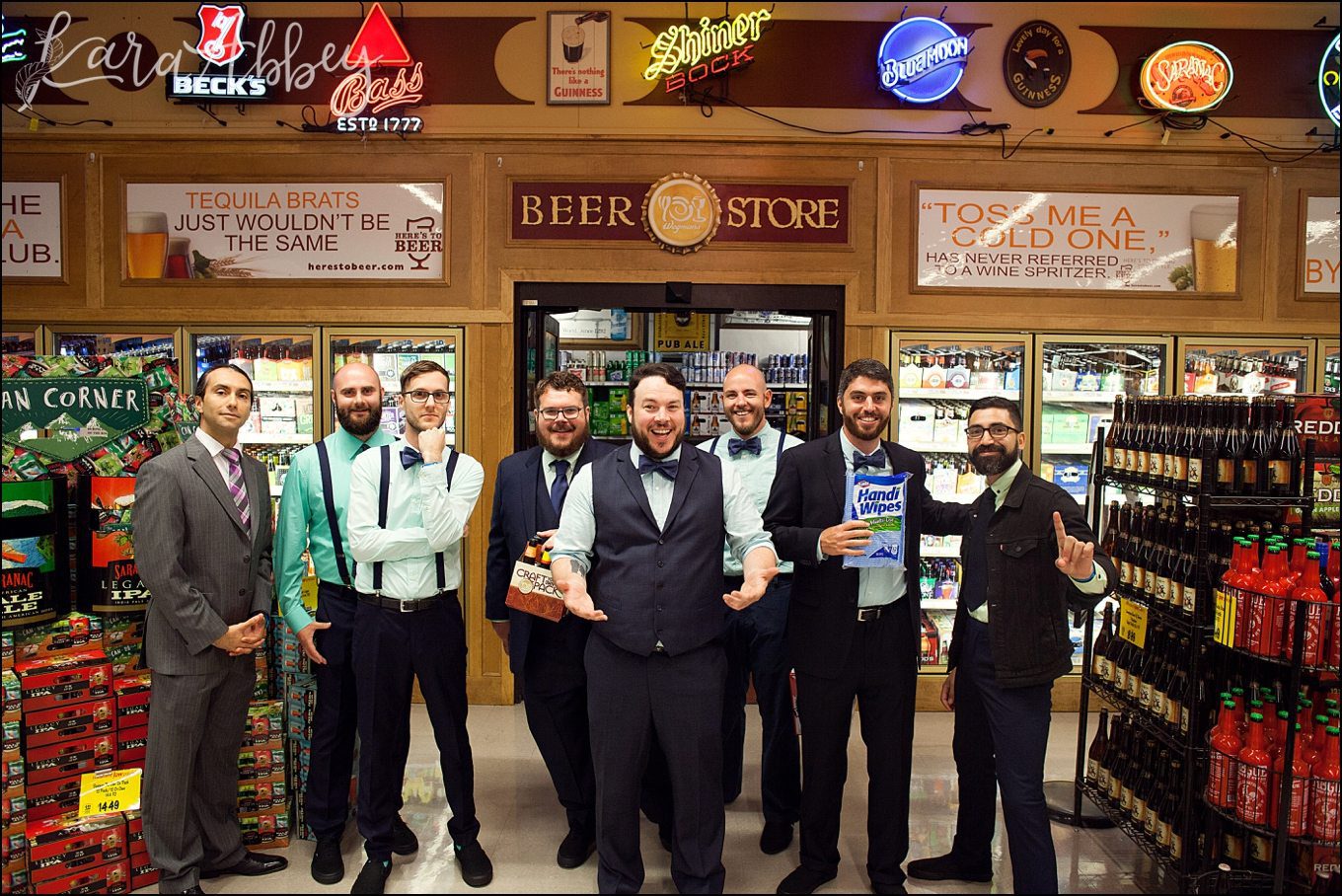 Rustic Pastel Rainy Summer Wedding Groomsmen in Wegmans in Ithaca, NY by Kara Abbey Photography in Irwin, PA