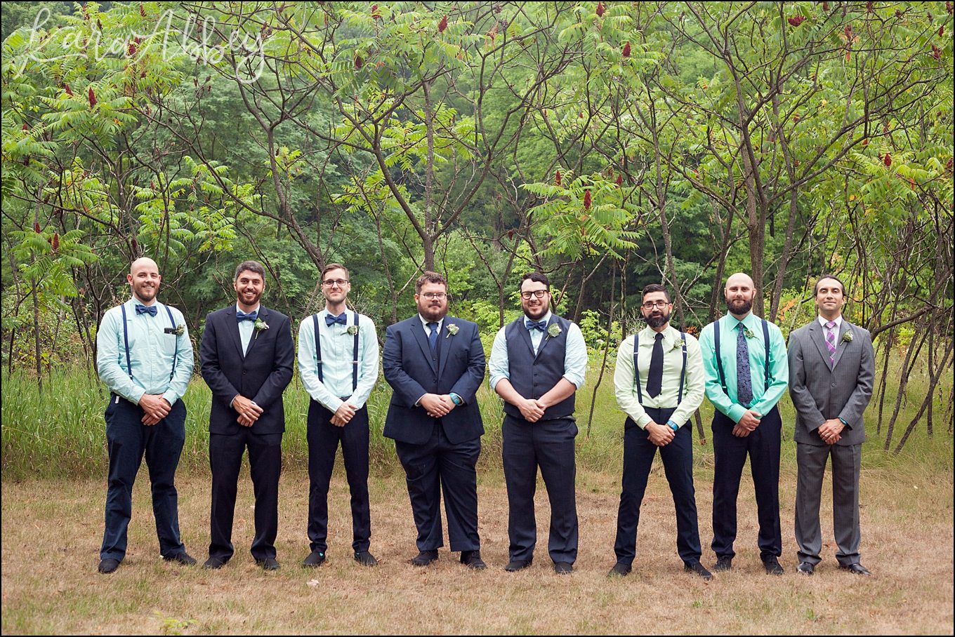 Rustic Pastel Rainy Summer Wedding Groomsmen at Robert Treman State Park in Ithaca, NY by Kara Abbey Photography in Irwin, PA