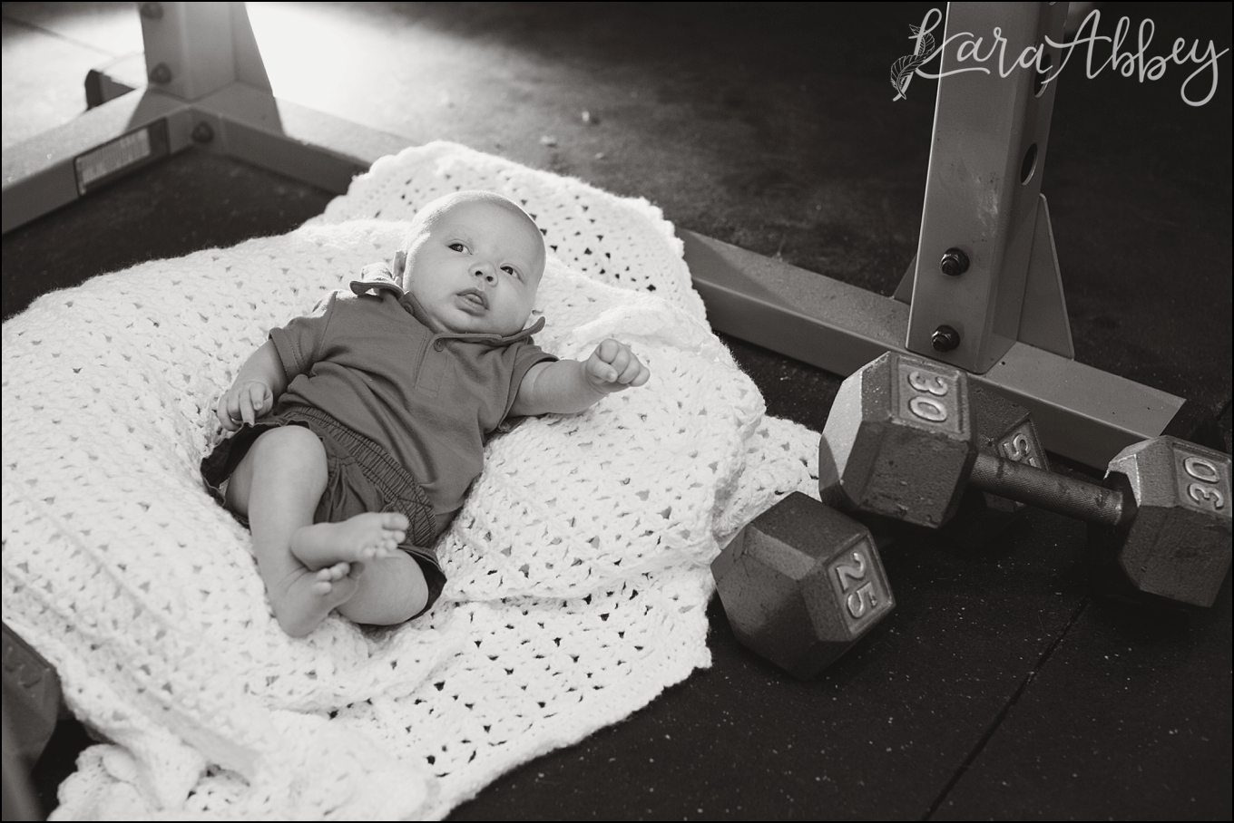 In Dad's Gym - Family & Newborn Photos at Home in Owego, NY by Kara Abbey Photography in Irwin, PA
