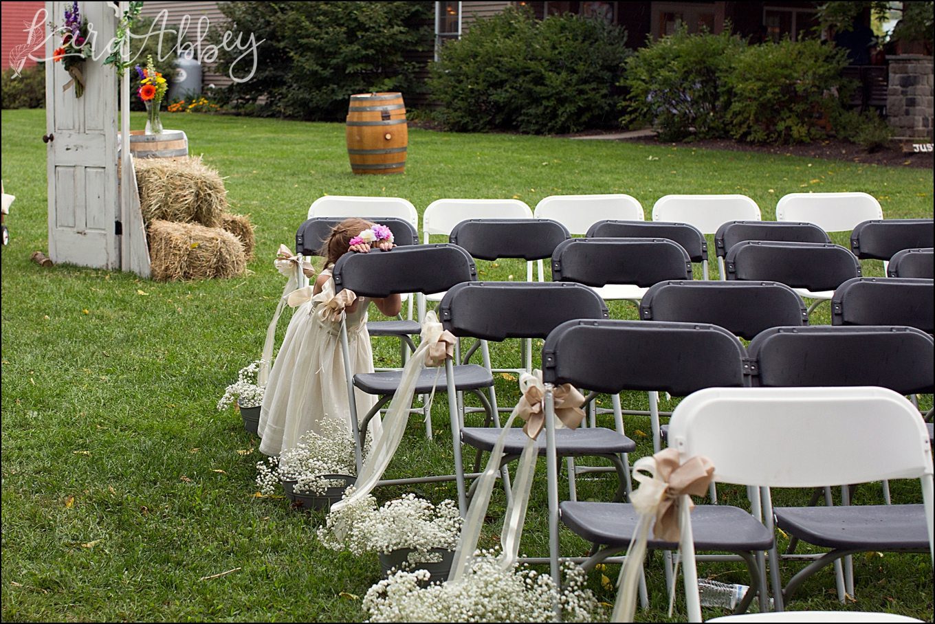 Summer Outdoor Grovedale Winery Wyalusing, PA Wedding Portraits with Shy Flower Girl by Kara Abbey Photography in Irwin, PA