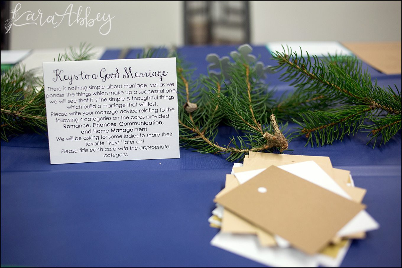 Winter in Paris Themed Bridal Shower - Fresh Pine as a Table Runner, Silver Snowflakes, and Candles - in Irwin, PA