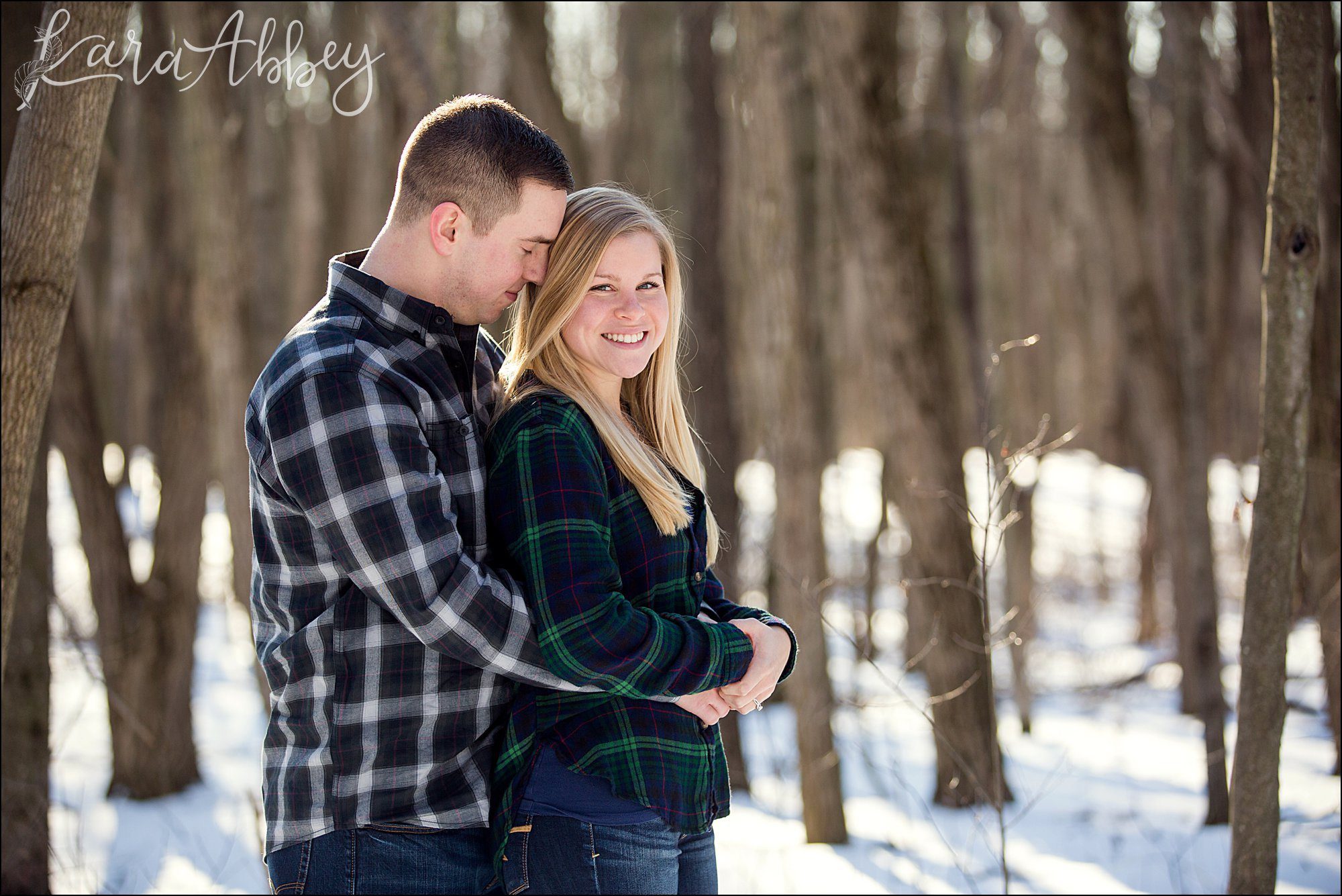 Snowy Winter Engagement Photos at Golden Hour