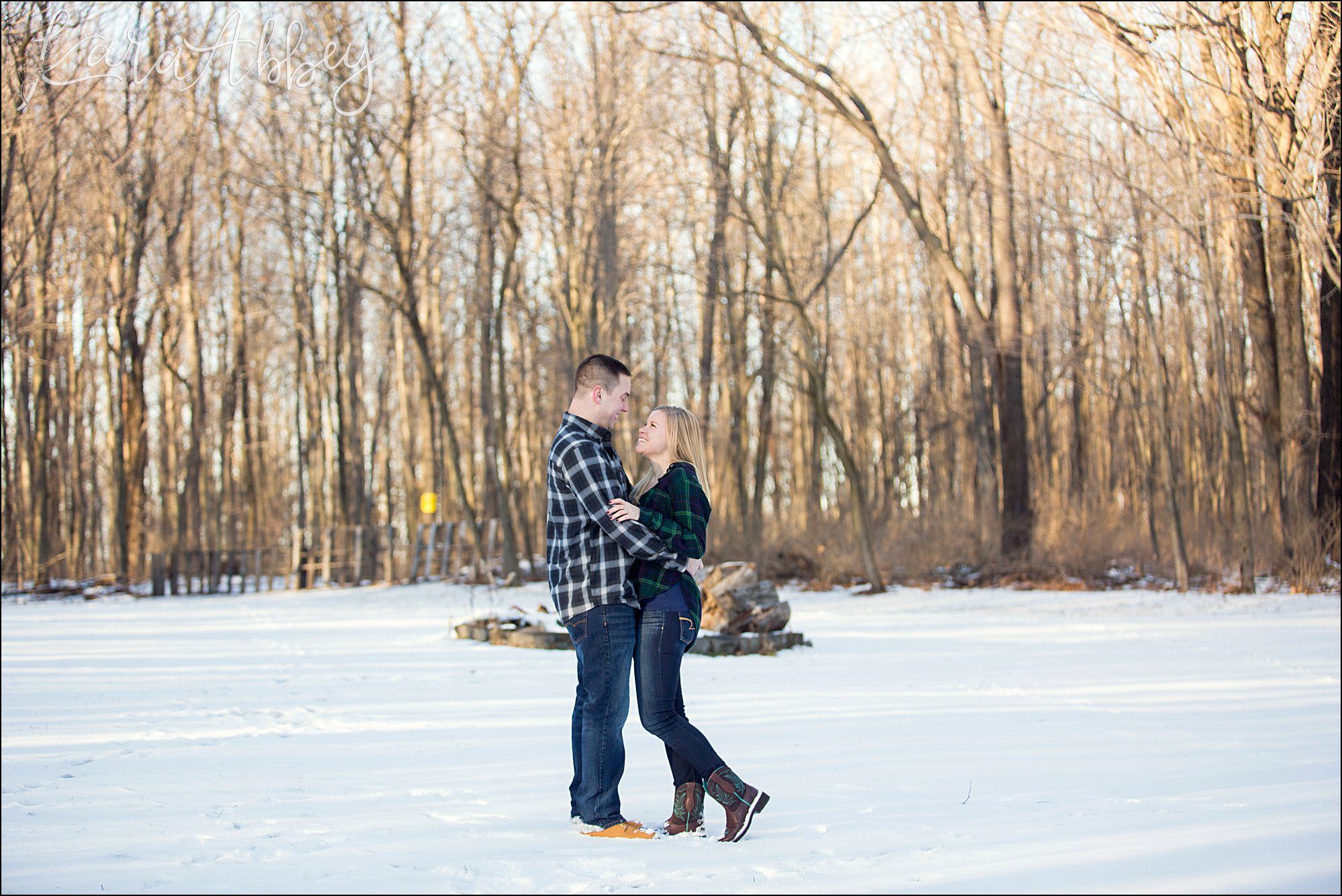 Snowy Winter Engagement Photos at Golden Hour