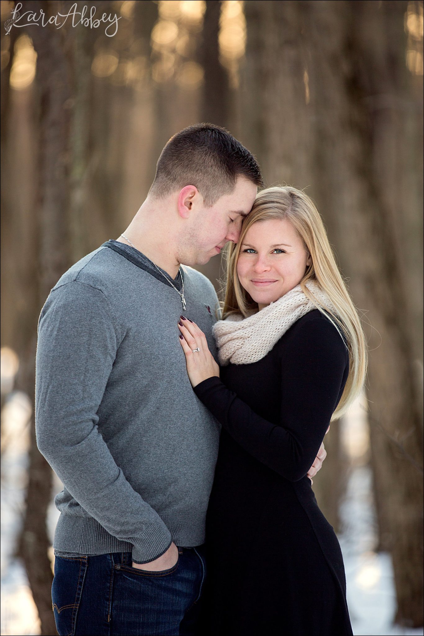 Snowy Winter Engagement Photos at Golden Hour