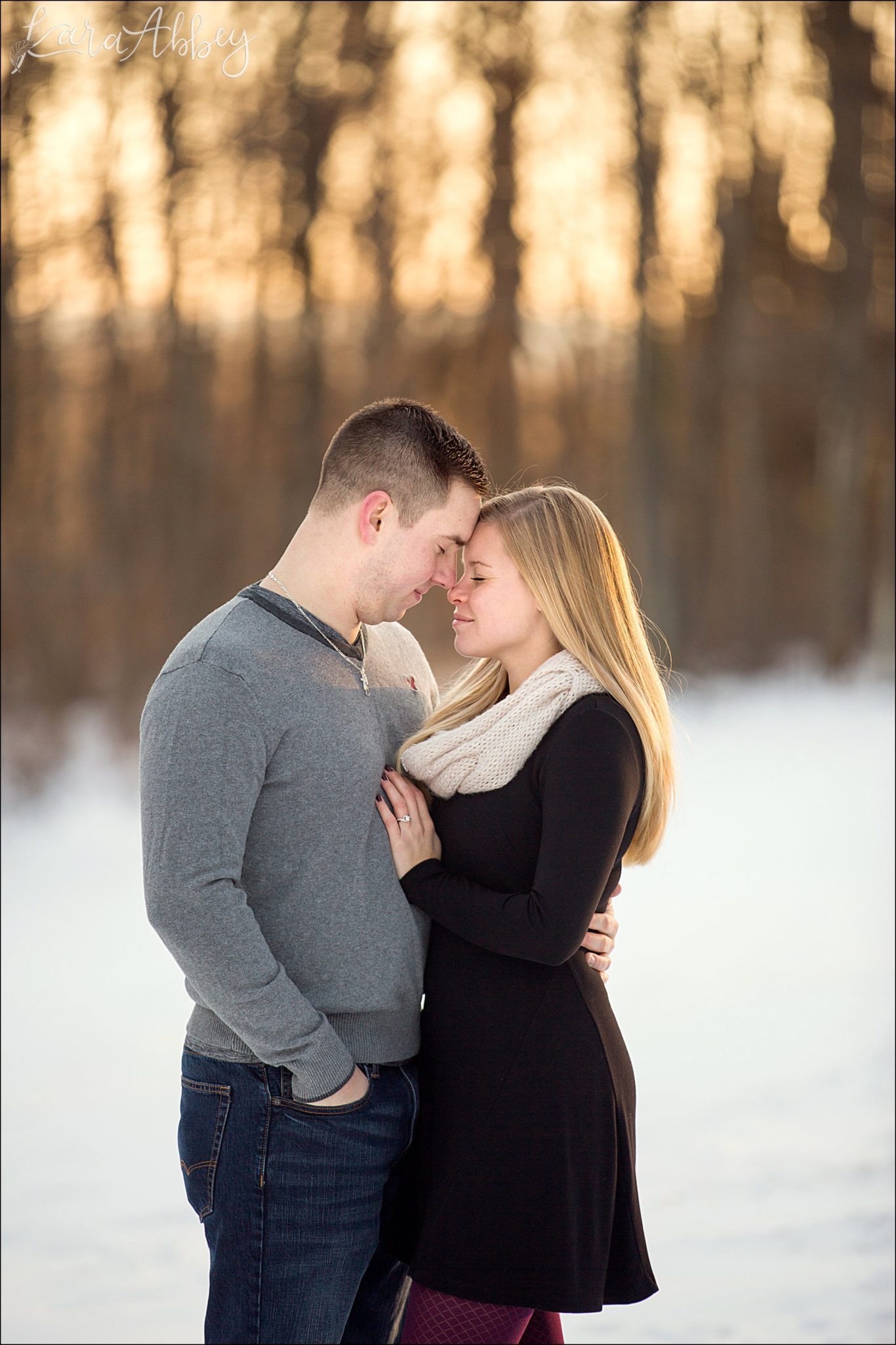 Snowy Winter Engagement Photos at Golden Hour