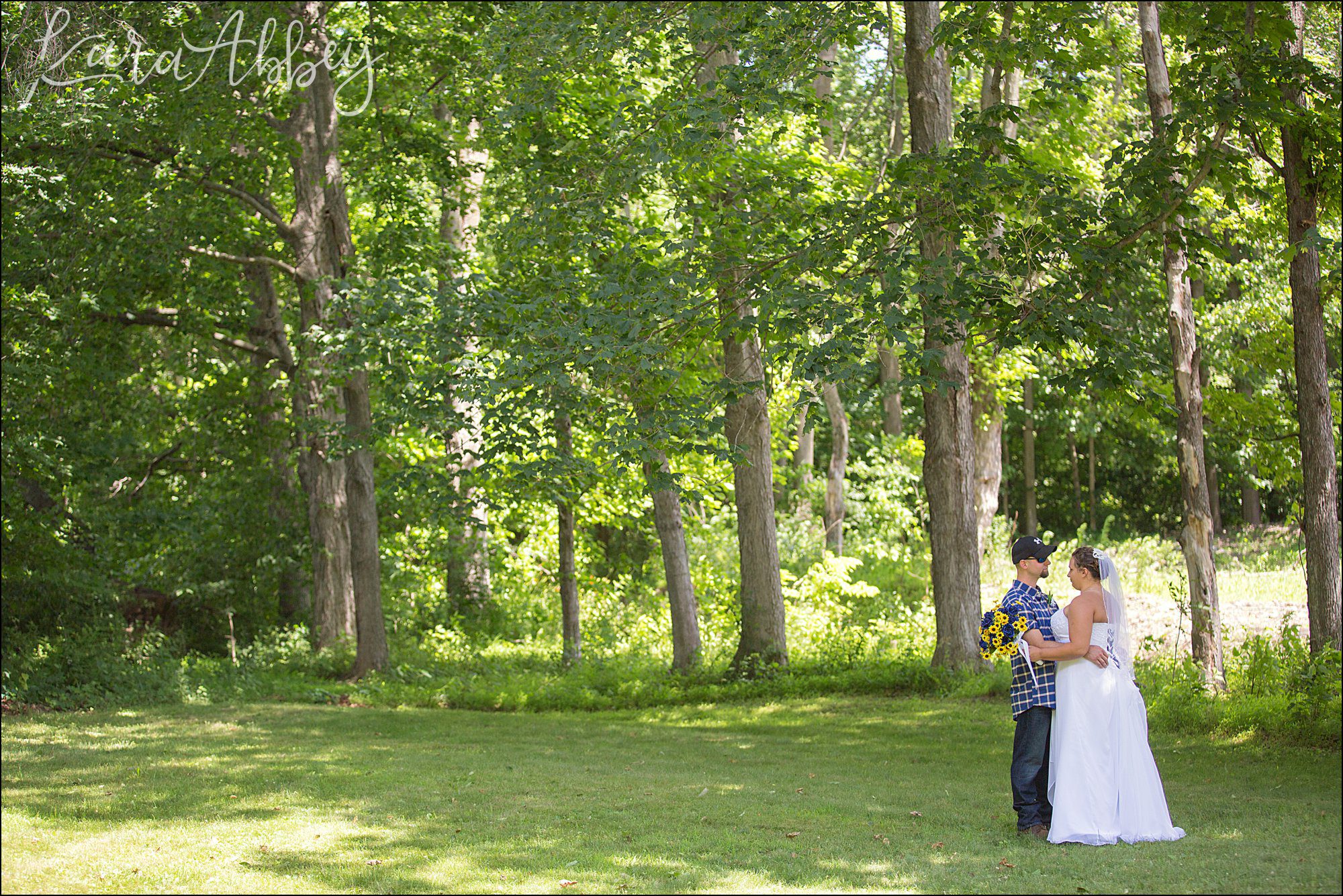 First Look at Laid Back Rustic Chic Summer Wedding at the Inn on Quarry Glenn in Towanda, PA