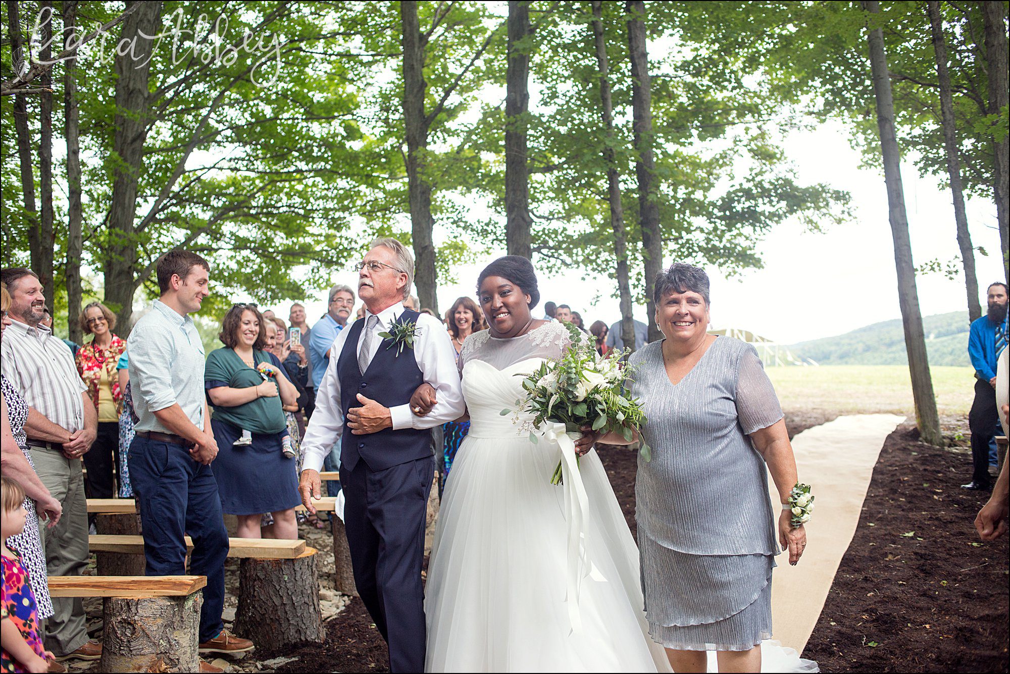 Summer Backyard Navy Wedding - Ceremony in the Woods