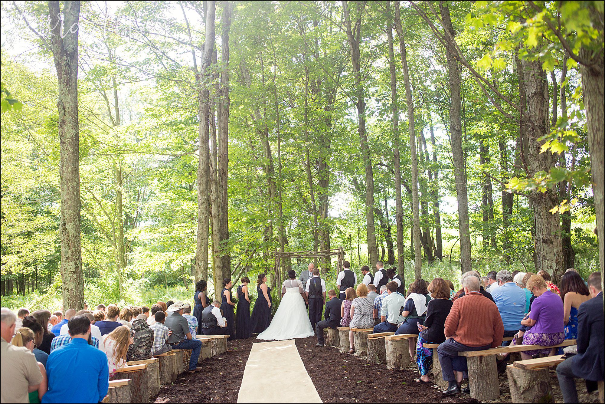 Summer Backyard Navy Wedding - Ceremony in the Woods