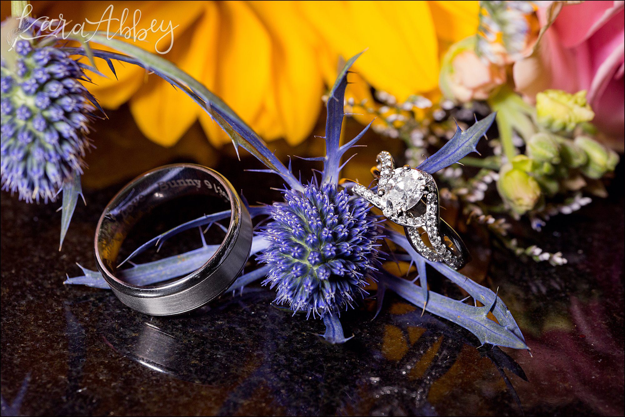 Sparkly Diamond Wedding Rings on Blue Thistle