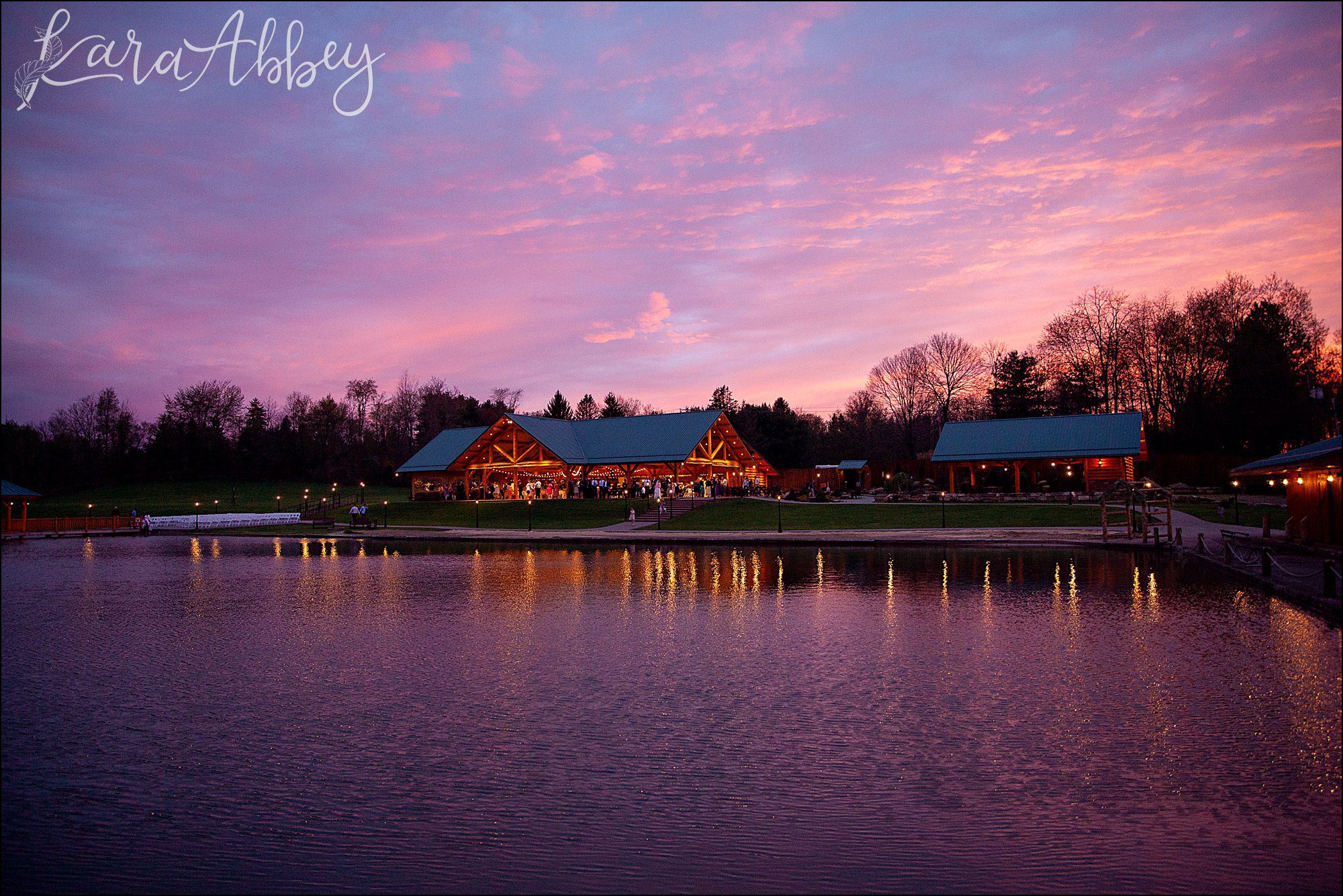 Vibrant Pink Sunset after Rain on Wedding Day at The Gathering Place at Darlington Lake