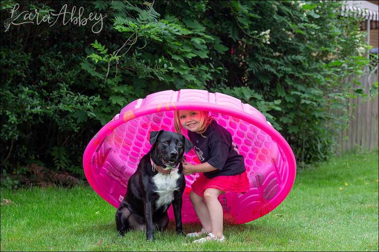 Black Lab And Toddler Using Pool as an Umbrella in Irwin, PA