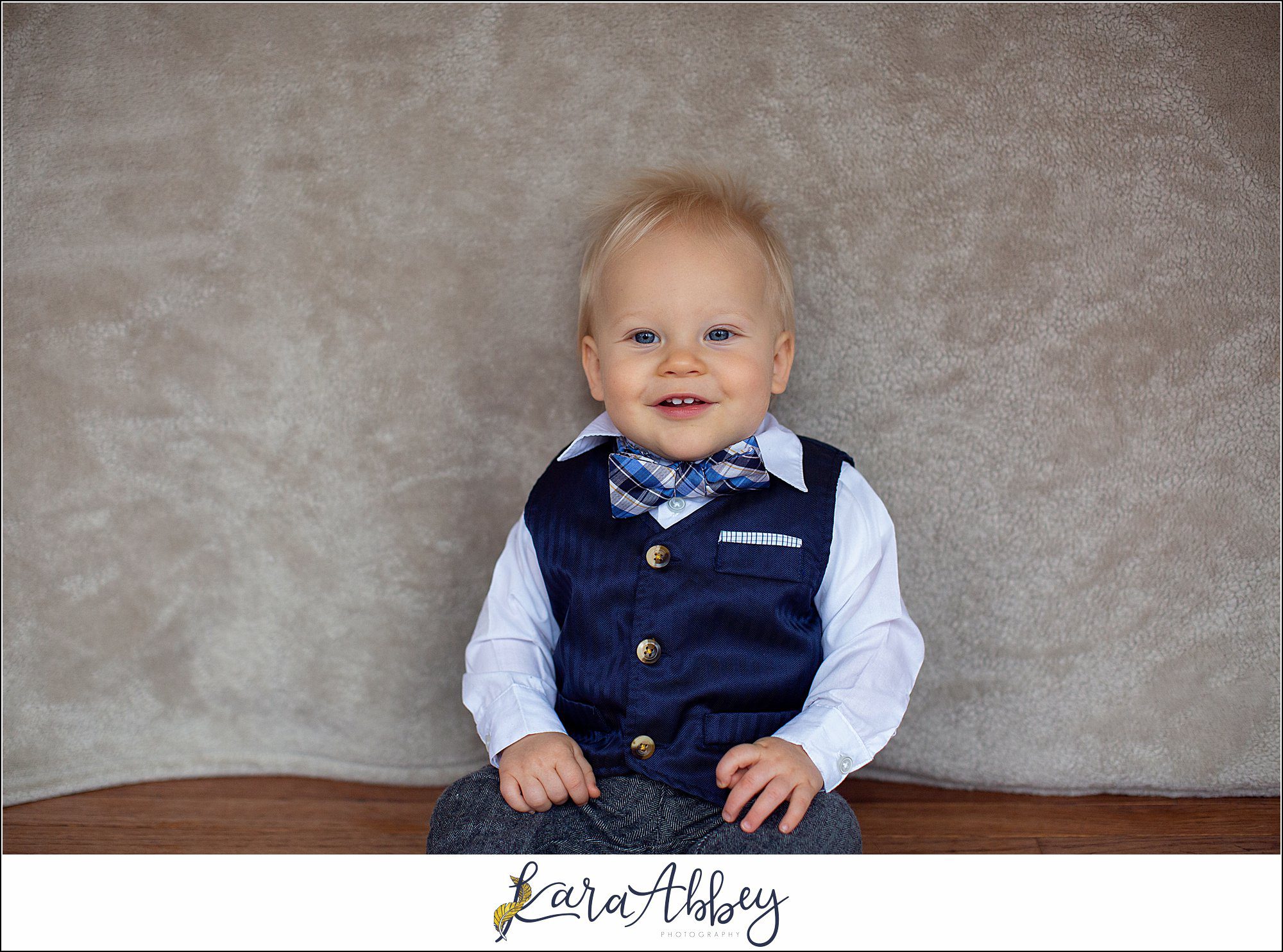 Leander Roxas 12 Month Old Milestone Photos in Irwin, PA - 1 Year Old Portraits in a Navy Vest & Bowtie