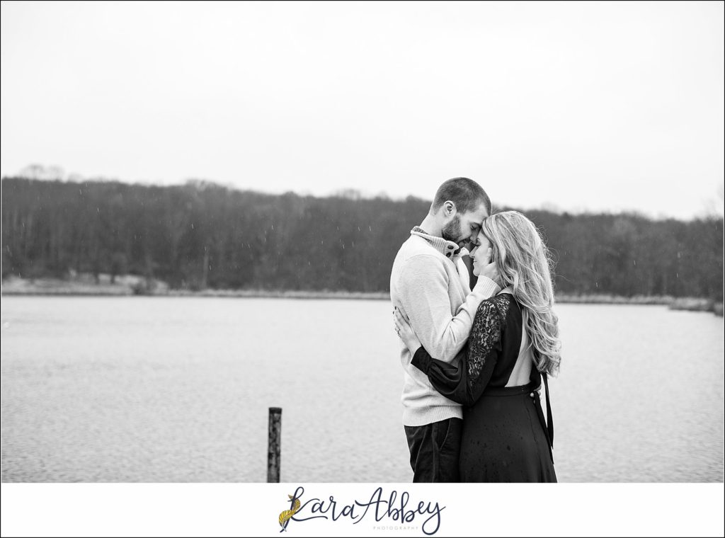 Cold Rainy Engagement Session on Family Property along a Lake in Pennsylvania by Kara Abbey Photography