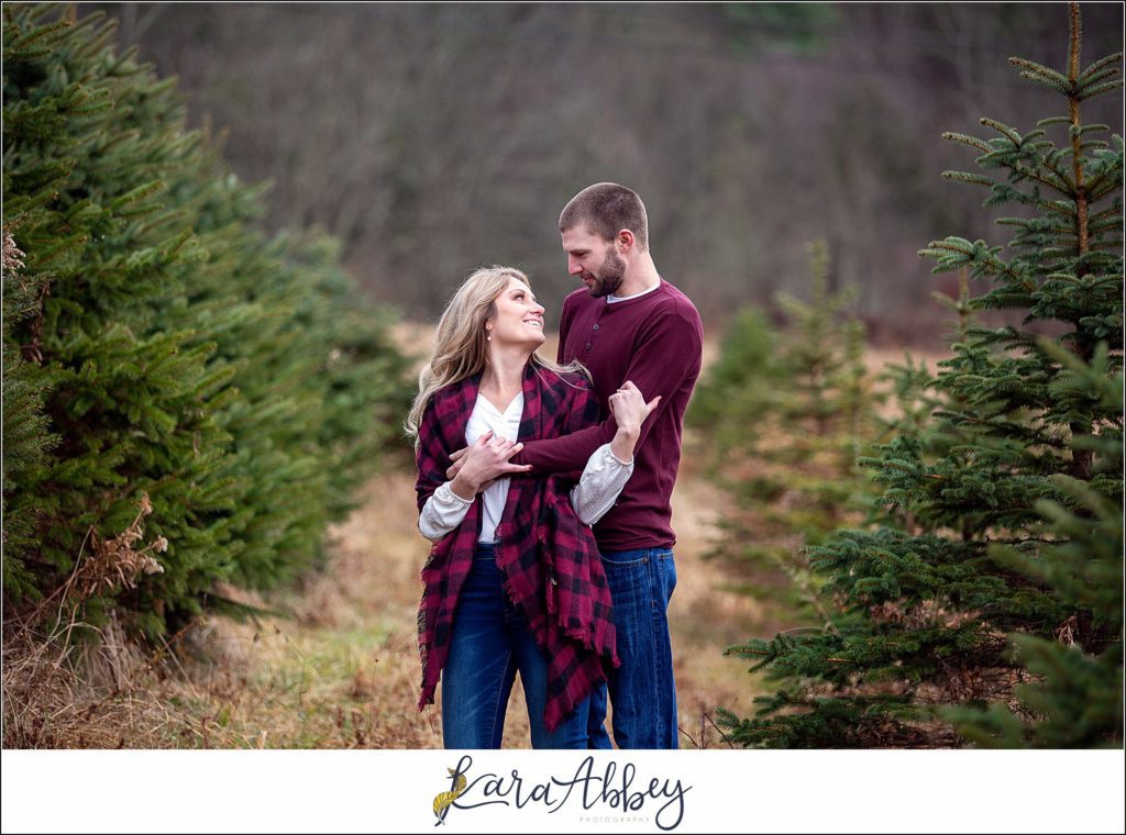 Cold Rainy Engagement Session on Family Christmas Tree Farm in Pennsylvania by Kara Abbey Photography