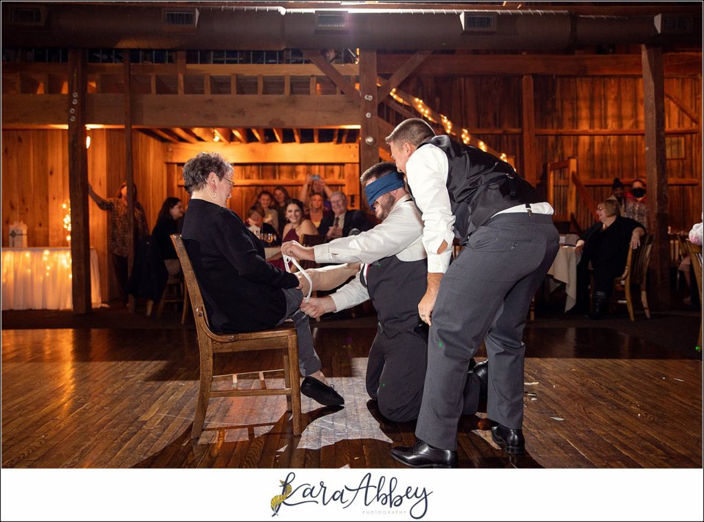 Cranberry Fall Wedding at Bell's Banquets in Mt. Pleasant - Bouquet & Garter Toss Reception