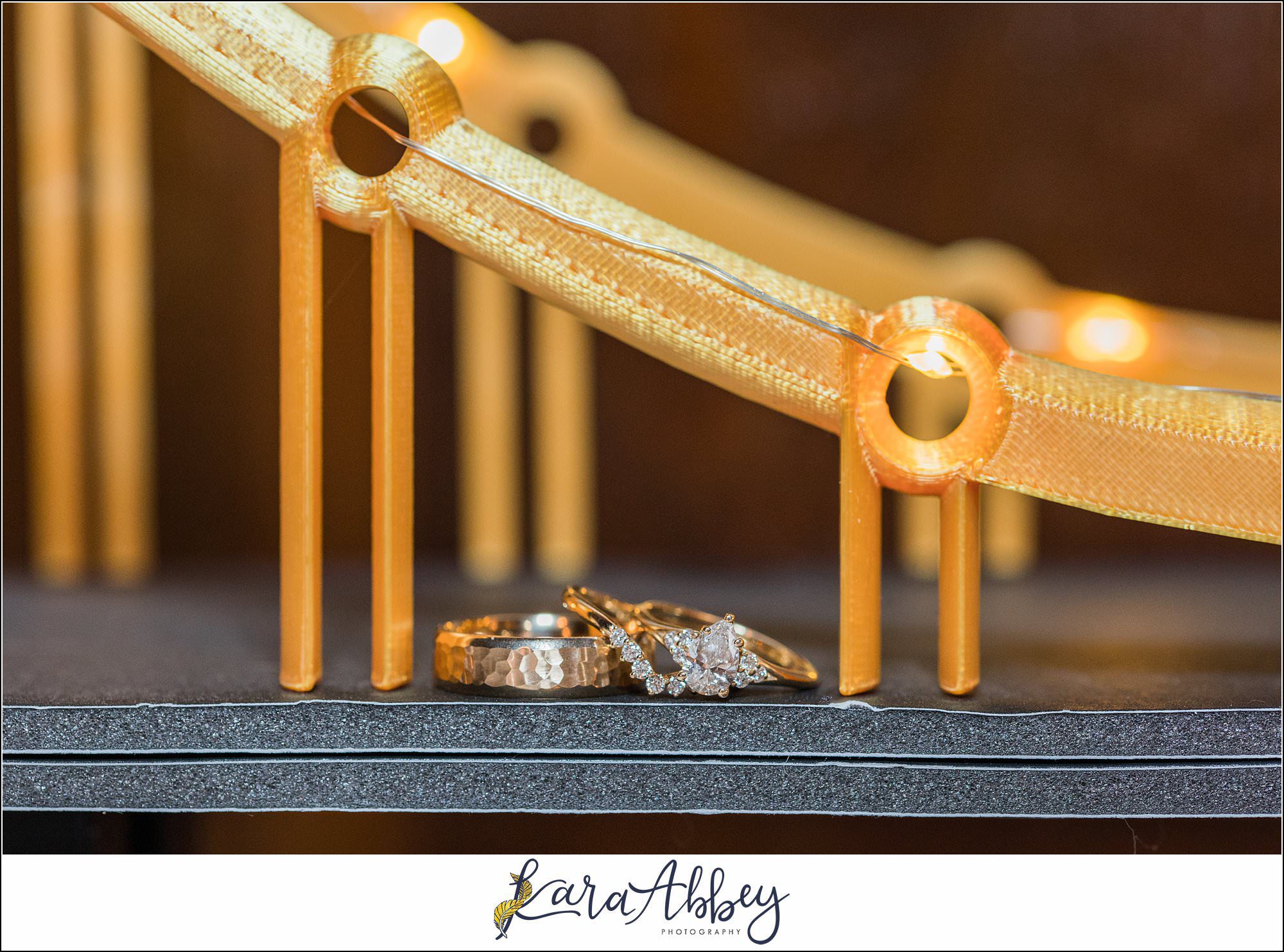 Summer Wedding at Laube Hall in Freeport, PA Wedding Rings on Yellow Bridge